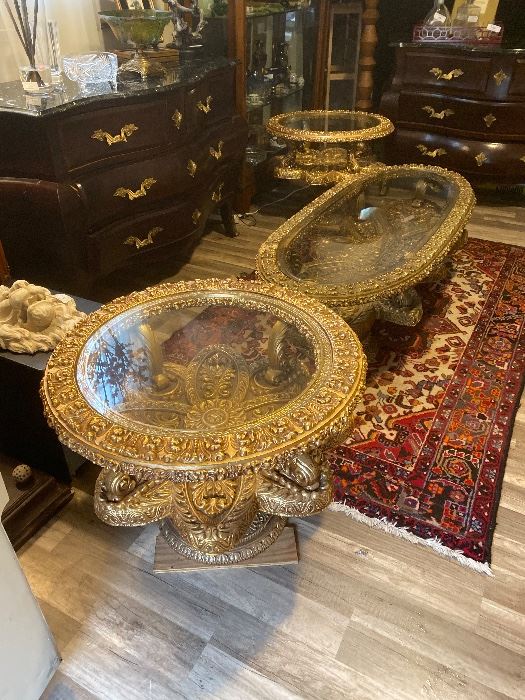 Amazing hand carved glass top tables, oval coffee table and two round side tables