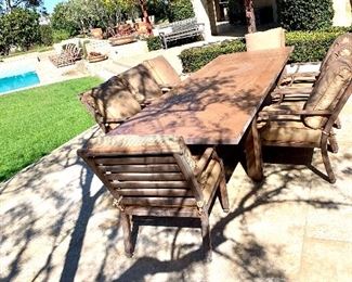 Castelle-  Rectangular Extension Dining Table with Woven Cast Top. 136" x 44".  Main table is 84"  with (2) 26" extensions. Hand crafted Cast Aluminum.  8 Deep Seating Sling Dining Chairs- Sunbrella fabric