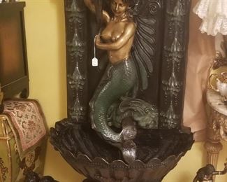 Bronze mermaid water fountain