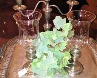 One of several silver plate trays; candle holders