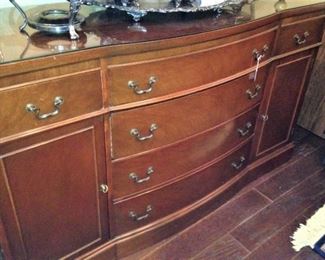 This buffet provides great storage and is fitted with glass for the top.