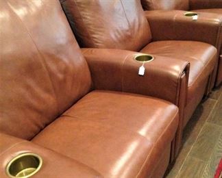 Three leather easy-recline chairs