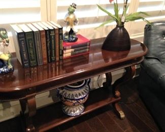 Sofa table; musical frog statues
