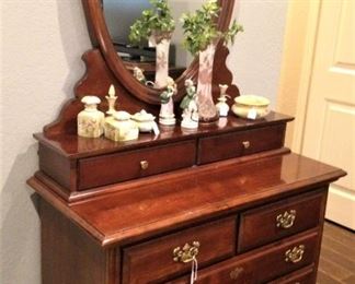 Dresser with oval mirror