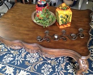 Large coffee table; decorative containers; candle holder