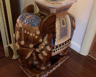 Majolica style elephant guarded seat