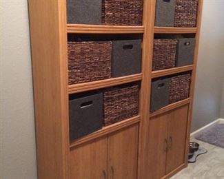Two Book cases with cloth baskets