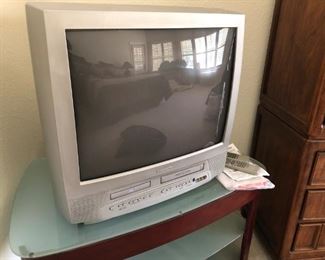 Television with VCR and DVD player built in