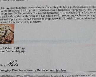 Lot 832 Ring-14K White Gold Band With Center Stone 2.01K- Ladies multi rings  put together, center ring is 18k white gold has a 2.01ct Marquise center diamond I/SI2 GIA cert#1162577946 with 50 side princess shape diamonds @ 2.90cttw G/Si1, 20 round diamonds @ .18cttw G/SI1i quantity of 4 round diamonds @ .13ct each G/SI2 for a total weight of .52cttw.  On each side of the center ring is a 14k white gold 3 stone ring each center is 3/8ct princess shape HI/I2 and 2 princess shaped diamonds @ 3/8cttw HI/I2 with 10 round diamonds @ 1/5cttw HI/I2, for a total for both rings @ 2.00cttw.