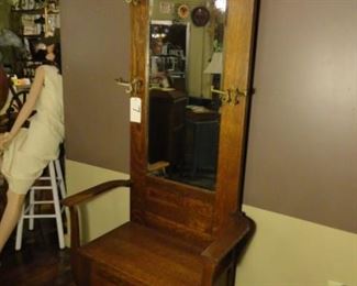 Vintage Hall Tree- C.H. Campbell Shelbyville, IN
77"H x 35 "W x 19"D
Oak wood with hooks and storage compartment under seat