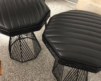 Pair of Bend Goods leather ottomans 