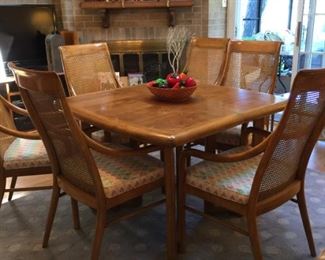 Table with leaves & 6 chairs