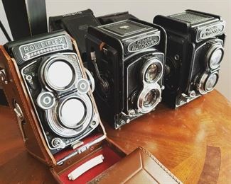 Rollieflex 3.5 f and pair of Minolta Autocord cameras