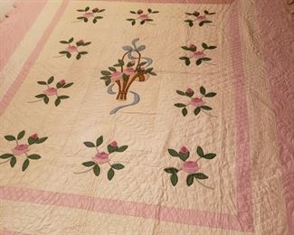 Handmade satin appliqued quilt 
