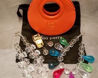 Lisa Perry purse and costume necklaces plus a Marcel Boucher wristwatch