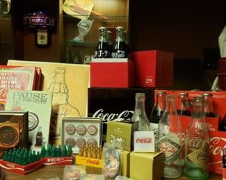 Vintage Coca Cola including Lucite containing  bottle caps from Ethiopia, Japan, Germany, Turkey & Argentina and miniature cases of Coke bottles