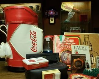 Coca Cola items including books and nightlights