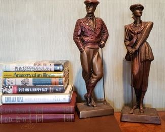 Denker & Co. golfer statues and books