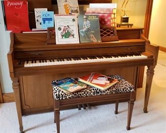 Kimball Electramatic piano with music books and music rolls