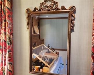 Beveled gilt framed mirror