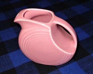  L91= Fiesta pink disc juice pitcher (5.5”): $14.