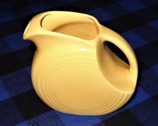L92=Fiesta yellow disc juice pitcher (5.5”): $ 18.