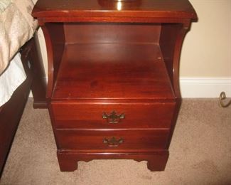 one of a pair of mahogany nightstands