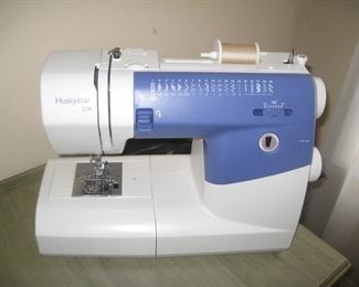 Huskystar 219 sewing machine, lots of notions, some patterns