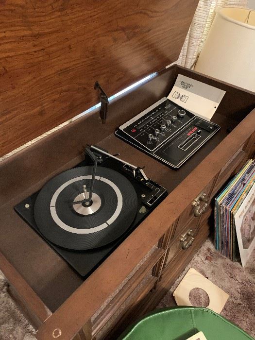 Cabinet stereo:  am/fm, record player & 8-track