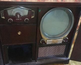 1951 Zenith Porthole TV/Radio/Record Player. Measures 39"wide x 38" high x 22.5" deep. The cabinet is in Very nice condition. This has not been tested.