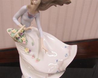 Lladro girl in the wind with basket