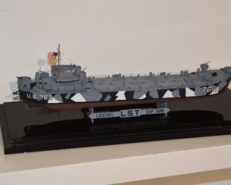 Several scale military ships and models.