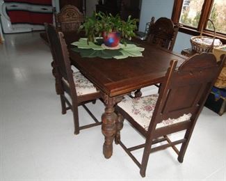 Gothic style dining room table with chairs