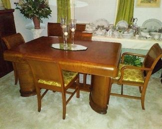 Absolutely Beautiful!! Table has 2 large leaves that are stored inside the table
