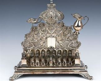 A LARGE STERLING SILVER HANUKKAH LAMP