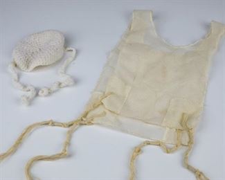 A PAIR OF TZIZIT AND KNITTED KIPPAH FOR A BRIS MILAH.