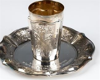 A STERLING SILVER KIDDUSH CUP WITH UNDERPLATE