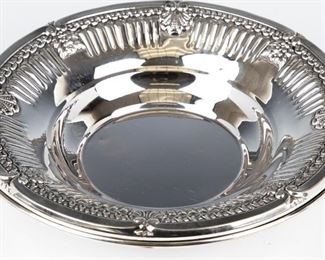 A STERLING SILVER FOOTED BOWL.