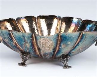 A SILVER HAND HAMMERED FOOTED BOWL. Probably Italy,