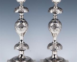 A LARGE PAIR OF SILVER SABBATH CANDLESTICKS