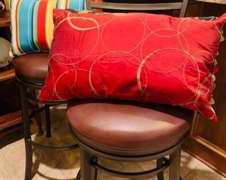 Lots of Decorator Pillows and Two Barstools