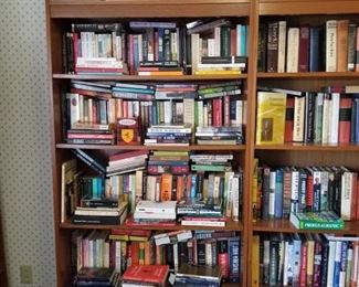Bookshelf filled with books, hundreds of more books available