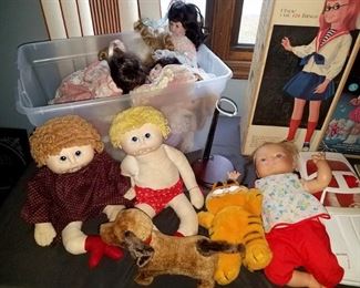 Vintage dolls and toys. Dolls in bin $8 ea. Cabbage Patch dolls $5 ea. Vintage mechanical dog $10. Garfield $3. (Baby doll and white car on right are sold. ) . NOW all are 25% off listed prices