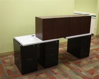 Just one example of the 2-drawer file cabinets for modular desk formations....the cabinet on top is a lockable wooden storage cabinet that can be hung on the wall...great quality.