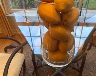 Lemons in a tall vase