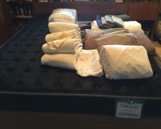 Black mattress, linens
