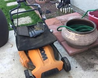 Folding lawnmower for small space storage