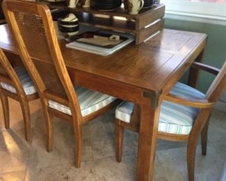 He recon dining table with six chairs, caned back, two arm chairs have back upholstery that matches seats