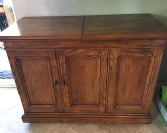Bar cart shown closed