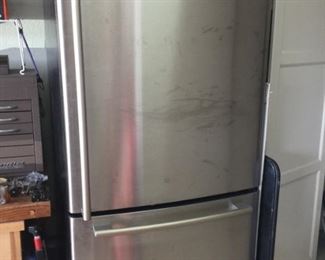 LG stainless refrigerator with freezer below